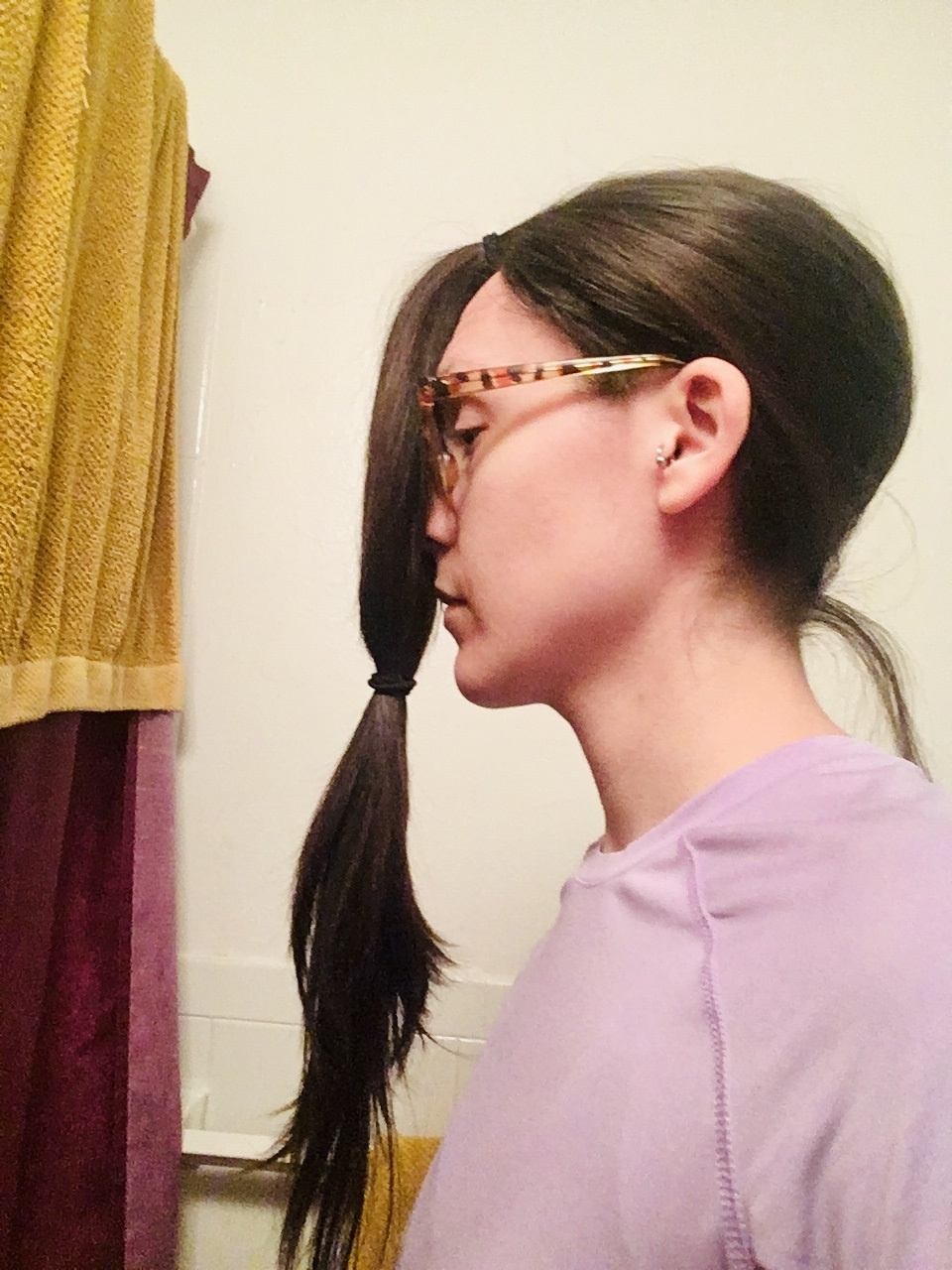 diy home haircut pull hair to front of face with ponytail
